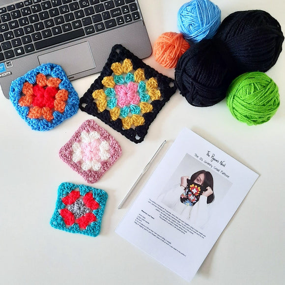 Rainbow snail crochet kit flatlay